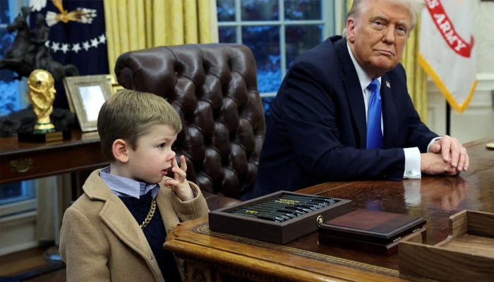Elon Musks son X A-Xii, whom he calls X, pictured with Donald Trump at the Oval Office. — Reuters
