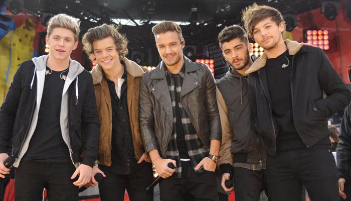 One Direction together in 2013 before Zayn Malik exited the group in 2015