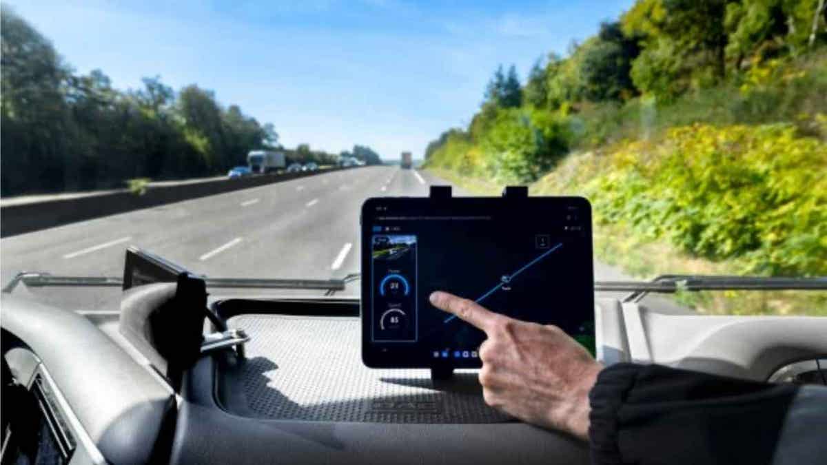 Coils built into the road charge the EV.